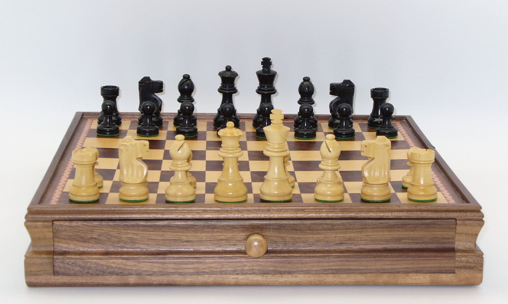 Chess Set - Small Black French Knight Chessmen on Walnut/Maple Chest